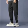 Erkekler Pantolon Spor Pantolonu Erkekler Joggers Moda Pantolon Erkek Giyim Siyah Buz İpek Nefes Alabaş Sokak Giyim Pantolon Elastik Sweat Techants 2022