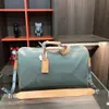 Borsa da viaggio laser borsa da aeroporto e borsetta progettate dal designer sono realizzate con materiali Dimensioni 47 cm