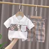 Nuovo 2023 bambini ragazze ragazzi plaid tuta di marca moda 2 pezzi abiti set polo maglietta e pantaloni corti tute bambini Designers Abbigliamento