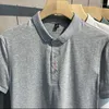 Polos masculinos 2023 Camisa de pólo masculino masculino Camiseta de algodão esportiva de lapela solta Moda sólida de manga Solid Casual Moda