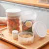 Opslagflessen draagbare meerlagige saladecompartiment pot roterende droge voedselbekers container voor kast huis keuken verzegeld