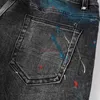 Designer-Kleidung, Amires-Jeans, Denim-Hosen, modische Amr-Slim-Fit-Jeans, Herren-Jeans mit aufgesprühten bunten Graffiti und ausgewaschenen Füßen, Amies Distressed Ripped Skinn