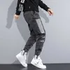 Męskie dżinsy moda 2022 szczotkowane szare dżinsowe spodnie wiosna i jesień kombinezonów koreańskie młodzież luźne nogi spodażne dżinsy męskie p230522