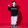 Stage Wear Kids Teenage Rave Abbigliamento Hip Hop Danicng Abbigliamento Felpa bianca nera Top Jooger Pantaloni per ragazze Ragazzi Costumi di danza jazz