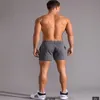 Nya män bomullssportbyxor som kör fitnessbyxor trendiga män 3/4 byxor hög elasticitet avslappnad 4/4 byxor av hög kvalitet mode heta försäljning shorts