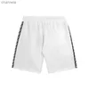 Shorts masculinos 2023 verão novo monstro monstro olhos estampados fita emendada capris solta shorts modernos relaxados