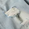 Roupas de grife Amires Jeans Calça jeans Amies 23ss High Street Patches coloridos perfurados feitos de água de lavagem antiga Elástico Slim Fit Ins Jeans de pé pequeno para homens Dist