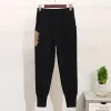 Qnpqyx novas calças femininas de duas peças nova moda 2 peças preto cinza calças superiores lantejoulas terno contas macacão feminino tricô outono inverno causal atacado