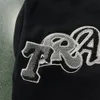 Wielka Brytania projektant Trapstar Tracksuit Mężczyźni Widcard Zip-Black /Monochrome 1 Najwyższej jakości haftowane kobiety z kapturem spodne