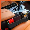 NIEUWE AUTO -ZEEL GAP VULRER ORGANGISER Tussen de voorstoelauto -organisator en opbergdoos Auto premium plastic console met bekerhouders