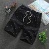 Mens shorts sommar utomhus andningsbar avslappnad strand lös mode träning gym springer män bomull streetwear jogger 230522