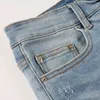 Projektant odzieży amires dżinsy dżinsowe spodnie amizy moda uliczna męska plisowane zmarszczki nerkowce plastry kwiatowe rozbite otwory jasnoniebieskie szczupłe dopasowanie mała opłata