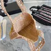 Luxe ontwerpers Stranddriehoek prad handtassen Dames heren schoudertas vanity clutch bagagetas bakken portefeuilles Cosmetische tassen Geweven crossbody Raffia mode Strozak