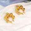 Brincos de argolas de tendência de dubai brasileira Dubai ouro banhado a cobre Twisted Acessórios de jóias de moda para mulheres presentes de aniversário