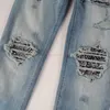 Projektant odzieży amires dżinsy dżinsowe spodnie amizy moda uliczna męska plisowane zmarszczki nerkowce plastry kwiatowe rozbite otwory jasnoniebieskie szczupłe dopasowanie mała opłata