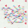 Novelty Items 50PCS Wholesale 10mmX30mm Rainbow Polymer Clay Candy Crutch Miniatures Christmas Crafts Embellishments Party Decoration G230520