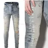 Odzież markowa Amires Jeans Denim Pants 869 Fashion 2022 New Amies Blue New Broken Letter Graffiti Trend Slim Fit Skinny Jeans Moda męska Distressed Ripped Skin