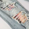 Tasarımcı Giyim Amires Jeans Kot Pantolon Amies 23ss High Street Delikli Eski Yıkama Suyundan Yapılmış Renkli Yamalar Elastik Slim Fit Ins Erkekler için Küçük Ayak Kotları Dist