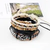 Braccialetti con ciondoli 4 pezzi / set Boho Gypsy Hippie Punk Marrone Pelle nera Beige Cord Wrap Knots Strati di perline di legno Set regolabile per uomo