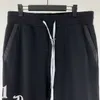 Tasarımcı Giyim Amires Pant 23S Yeni Amies Sonbahar Kış Drawstring Sanskrit Zip Cep Baskı Moda Çok Yönlü Lüks Moda Sıradan Pantolon 2023