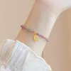 Bracelets à breloques Bracelet en cristal de fraise pour femme Design original avec des breloques fines pour la chance et l'amour perlé à la main
