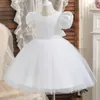 Abito da principessa in tulle tinta unita per bambina 2-8T Abito da ragazza di fiori con gonna con maniche a sbuffo di design con fiocco per bambini