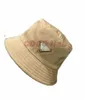 Cappelli a tesa larga 2023 Cappello da donna Cappello a secchiello in nylon Cappelli neri in metallo New Fashion Luxury Men Hat Primavera Estate Cappello da spiaggia all'aperto Design New J230520