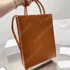 Mens Luxurys Tote Bag Womens Designer Tote Bags Luxury Shopping Bag Brand Letters Crossbody Bags Sacs à main en cuir véritable 2 tailles