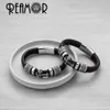 Bangle Reamor 12mm bredd flätade läder män armband 316l rostfritt stål korsa charms manschett armband armband trendiga manliga smycken