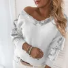 Kvinnors blusar ihåliga kvinnor V Neck Bow Patchwork Blus Fashion paljetter Elegant kvinnlig långärmad toppar Casual Loose Solid Pullover