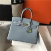 2024 Bag Platinum Classic Tote Wax Line Togo Calfskin Lychee Leather Dames Lock Handtas