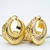 Huggie Dubai Gold Color Hoop örhängen Kvinnor Modesmycken Etiopiska afrikanska örhängen för brasilianska bröllop Guldpläterade öronsmycken