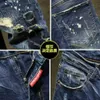 Nieuwe Chinese Versie Trend Trend Heren Blue Hole Stick Fabric Fabric Elastische Kleine rechte jeans eenvoudige gepersonaliseerde informele broek P2305222222