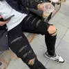 Roupas de grife amires jeans calças de jeans AMIES Marca de tendência Jeans Men angustiado Rapped Motocycle Biker Rock Hip Hop Pant Fashion Troushers Straight 24