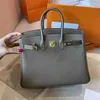 Hushållets tote 2024 Platinum Bag Women's Large Capacity Top Layer Litchi Grain Leather Crossbody Women's Handbag D4N4