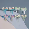 Cristal en gros 50 pcs/lot couleur fleurs motif imprimé dessin animé nœud papillon/forme d'arc perles acryliques bricolage bijoux boucle d'oreille accessoire