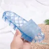 Modische transparente flache Sandalen aus Gummi im Designer-Stil für Strandreisen