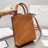 Mens Luxurys Tote Bag Womens Designer Tote Bags Luxury Shopping Bag Brand Letters Crossbody Bags Sacs à main en cuir véritable 2 tailles