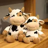 Vache noire et blanche poupée Hobby veau en peluche vache mascotte poupée tissu poupée oreiller cadeau d'anniversaire en gros