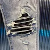 Abbigliamento firmato Amires Jeans Pantaloni denim Amies lavato danneggiato spazzolato con rivestimento argento Jeans blu in pelle combinata nera Slim Fit skinny strappato effetto consumato