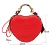 Bolsas de noite 2023 Bolsa feminina Personalidade de ponta Peach Heart Small moda Trend Trend Silk Bolsa Bolsa Mensageiro de ombro