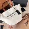 Kvinnors designer handväskor rive tote shopping väskor crossbody canvas axel väska bruna svarta färger lyx y handväska designers pures