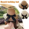 Chapéus largos Brim Ribbon Bowknot Women Straw Hat Top Top Sun feminino elegante Tour da praia de viagens ao ar livre macia e elegante