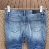 Designer Roupas Amires Jeans Calças Jeans Amies High Street Azul Vaca Collated Couro Lavado Faca Velha Corte Buraco Jeans Slim SLP Calças Moda Homens Mendigo Calças Distres