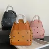 Şık tasarımcı sırt çantası lüks tasarımcı sırt çantaları pembe kılıf el çantası kadın erkek okul çanta arka paketler moda mektup m seyahat açık çantaları