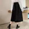 Kjolar mode pläd lång kjol för kvinnor vinter damer eleganta a-line mid-calf koreansk hög midja tjock stickad svart