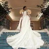 2023 Sexy Bling A Line Wedding Dresses Silver Crystal Beads One Shoulder Satin Illusion Long Sleeves Side Split Overskirts Satin Ball Gown Bridal Dresses Custom