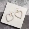 Dangle Küpeler Kore versiyonu Pearl Love Tatlı ve İnce Light Luxury Ear Hook Aksesuarları mizaç güzel bezelye