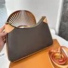 2023 Nuevo bolso de mujer Bolso de diseñador Bolso de hombro de lujo Bolso de bandolera de cuero casual de moda Bolso de cadena trenzada con hebilla de bloqueo bolso de marca con estampado clásico