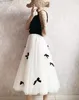 Jupes 2023 Vintage Tulle Jupe femmes élastique taille haute maille perle nœud décoration Midi plissé Tutu femme Jupe Longue